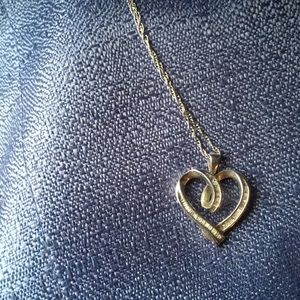 Sterling silver and diamond heart shaped pendant